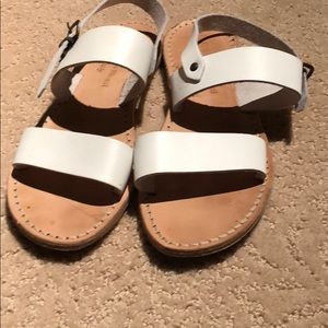 White flat sandals